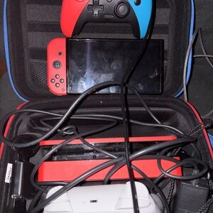 Nintendo Switch 2 wireless controllers, one battery operated controller, case